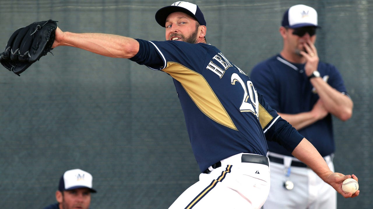 Former Brewers closer Henderson hoping he's able to pitch, contribute in '15